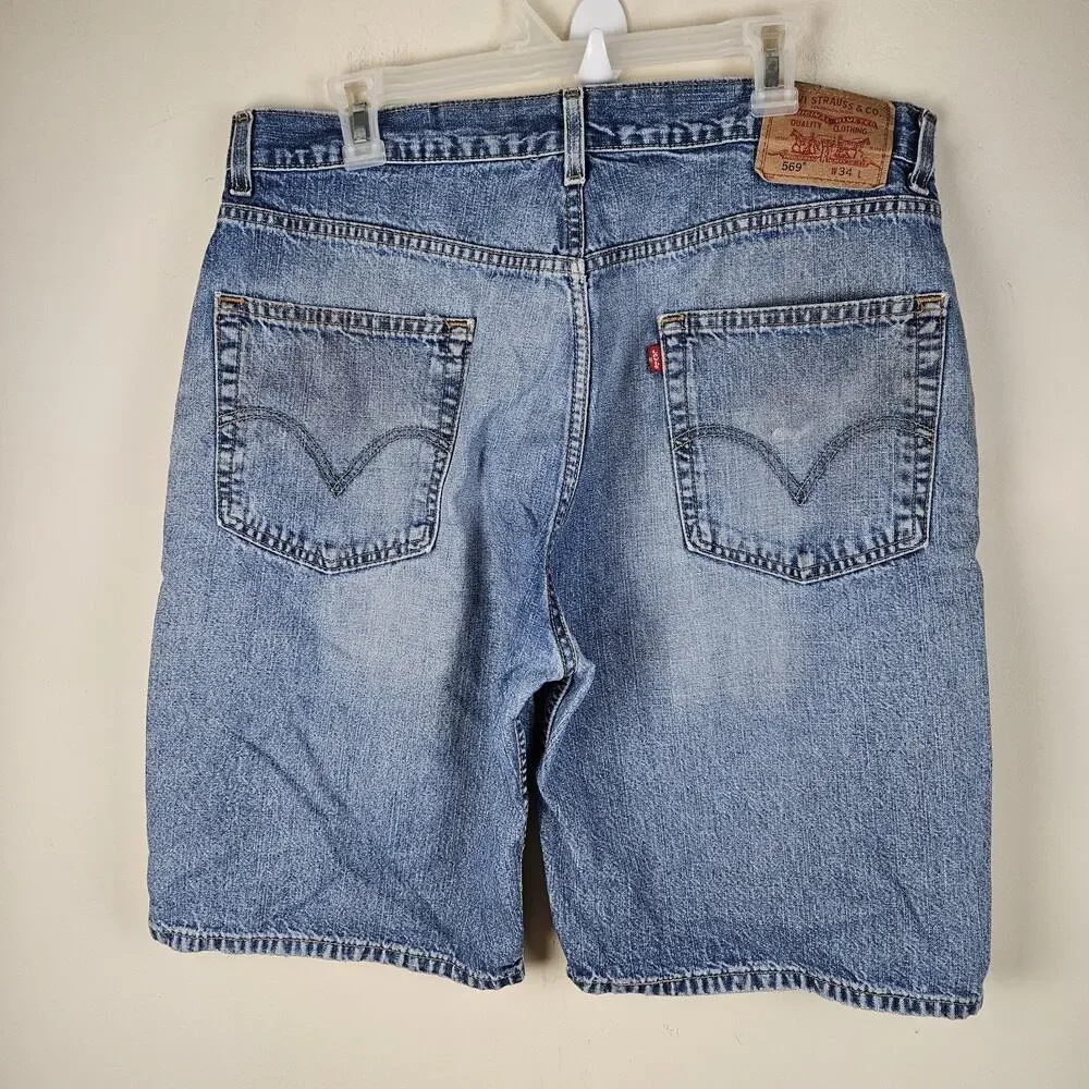 Levi's 569 Shorts Men’s Size 34 Blue Denim Holes fray fade Distressed Jorts